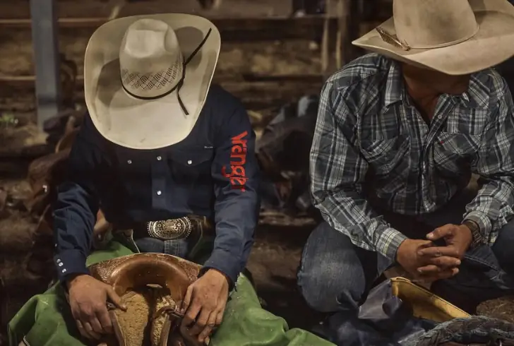 Cowboys gathered together before arena event